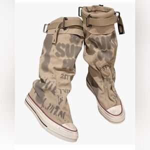 Women’s size 40 or 9.5 knee high graffiti print sneaker boots.  NWOT